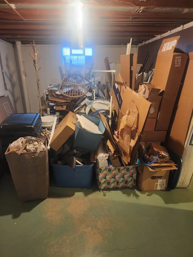 Roll-off dumpster container at job site for 8 Yard Dumpster Rental in New London